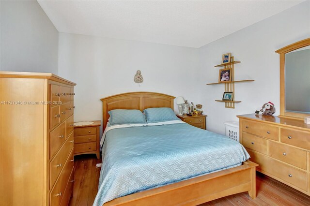 bedroom featuring wood-type flooring