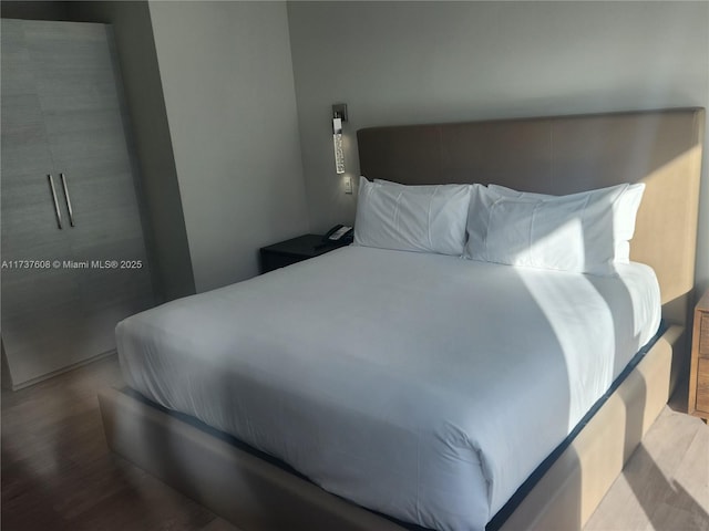 bedroom featuring hardwood / wood-style floors