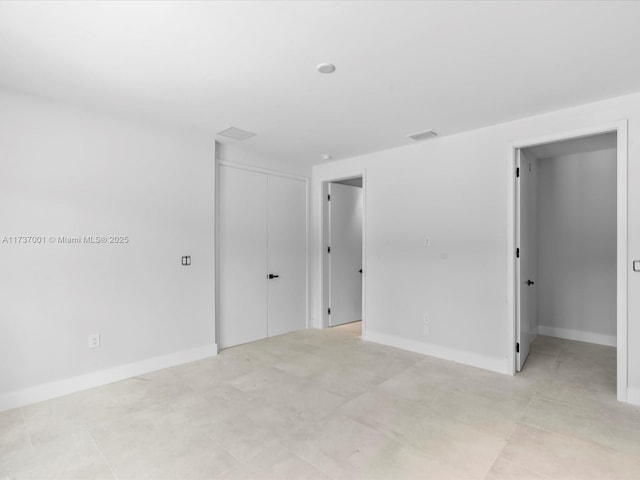 17301 SW 52nd Ct, Southwest Ranches, FL 33331 - spare room featuring baseboards and visible vents
