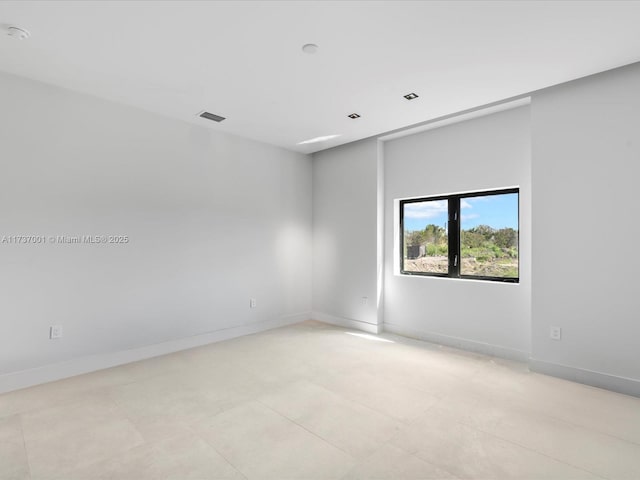17301 SW 52nd Ct, Southwest Ranches, FL 33331 - spare room featuring baseboards and visible vents