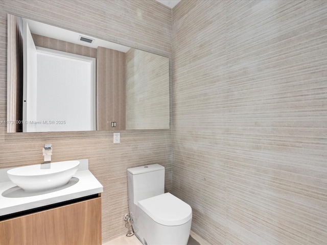 17301 SW 52nd Ct, Southwest Ranches, FL 33331 - bathroom with toilet, vanity, and tile walls