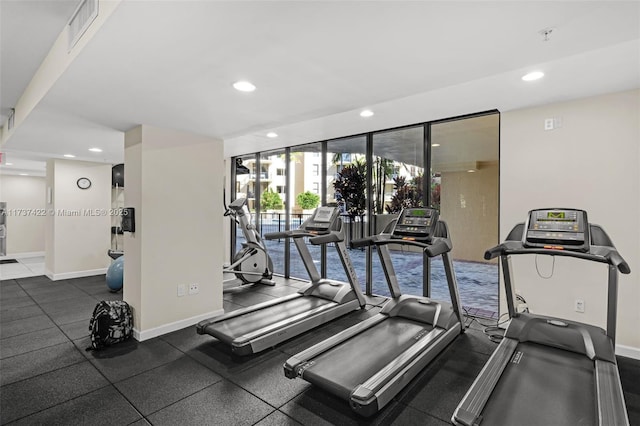 gym with recessed lighting, visible vents, and baseboards