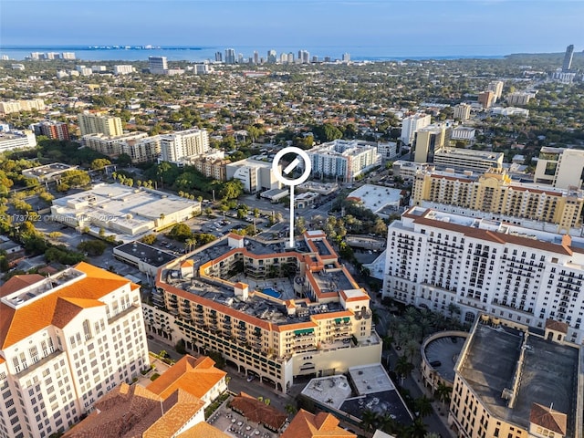 drone / aerial view with a view of city and a water view