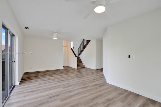 unfurnished room with ceiling fan and light hardwood / wood-style floors