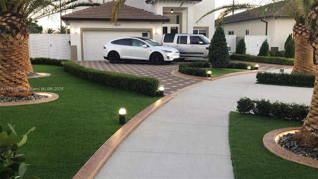 10290 SW 7th Ter, Sweetwater, FL 33174 - view of green lawn featuring concrete driveway and a garage