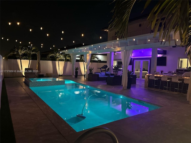 10290 SW 7th Ter, Sweetwater, FL 33174 - view of pool featuring outdoor dry bar, a patio area, a pool with connected hot tub, and fence