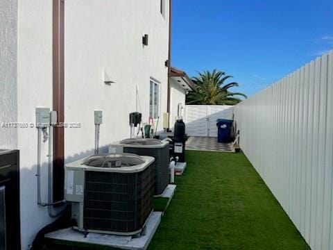 10290 SW 7th Ter, Sweetwater, FL 33174 - view of yard featuring central AC