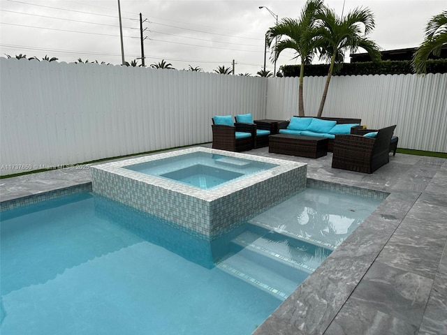 10290 SW 7th Ter, Sweetwater, FL 33174 - view of pool featuring a pool with connected hot tub, a patio, outdoor lounge area, and a fenced backyard