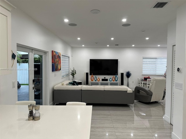 10290 SW 7th Ter, Sweetwater, FL 33174 - living room with visible vents, recessed lighting, and french doors