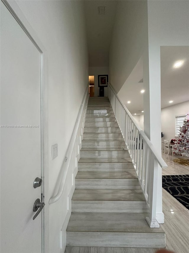 10290 SW 7th Ter, Sweetwater, FL 33174 - stairway with wood finished floors and recessed lighting