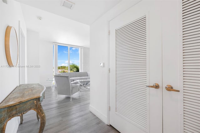 hall featuring light hardwood / wood-style floors