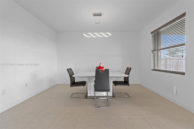 dining room with light tile patterned floors