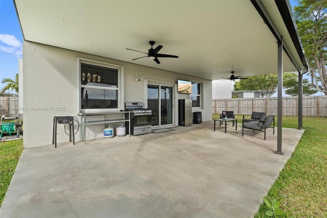 view of patio with ceiling fan