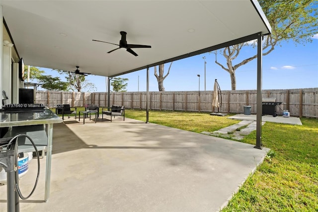 view of patio with ceiling fan