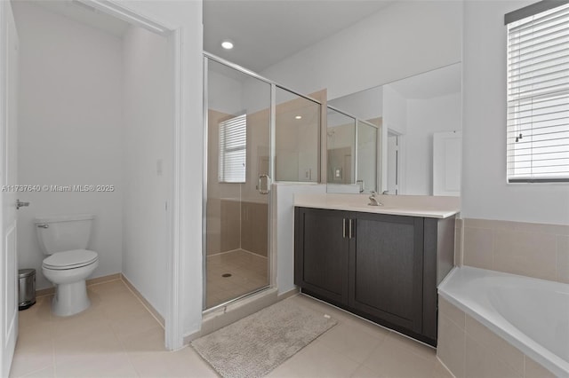 full bathroom with vanity, toilet, independent shower and bath, and tile patterned flooring