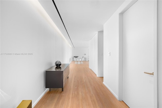 hallway featuring hardwood / wood-style floors