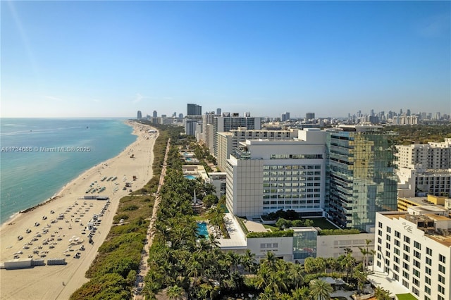 aerial view featuring a beach view and a water view