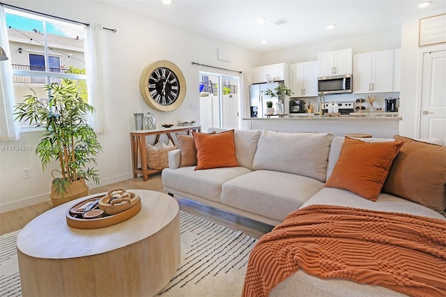 living room with light wood-type flooring