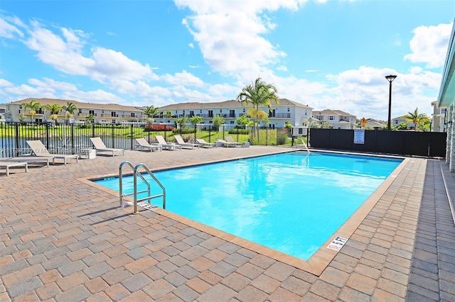 view of swimming pool featuring a patio