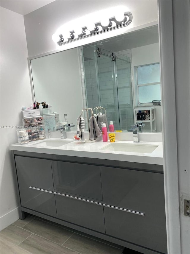 bathroom featuring vanity and walk in shower