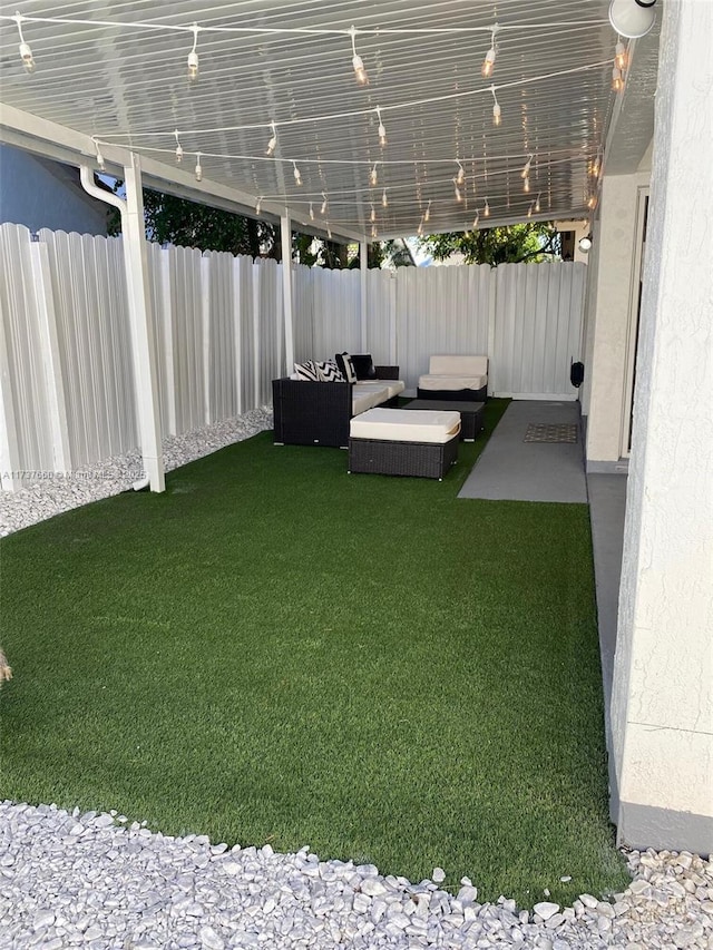 view of yard with an outdoor hangout area and a patio area