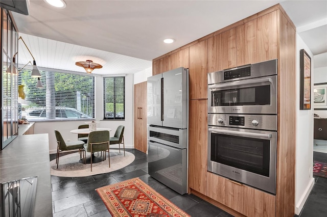 kitchen featuring double wall oven and stainless steel double oven