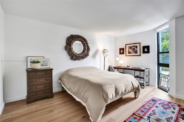 bedroom featuring light hardwood / wood-style flooring