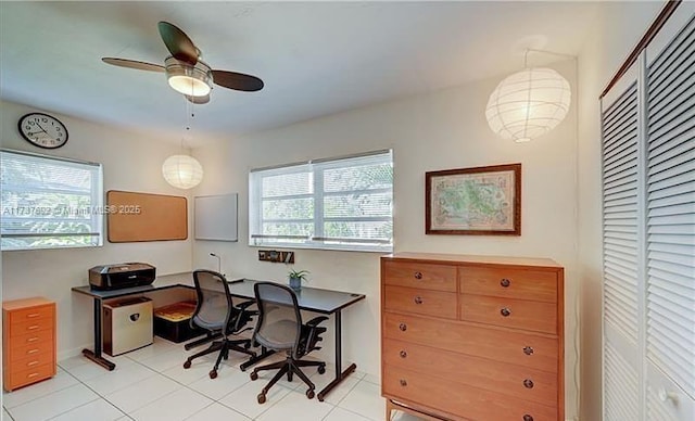 home office featuring ceiling fan and light tile patterned flooring