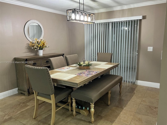 dining space featuring ornamental molding