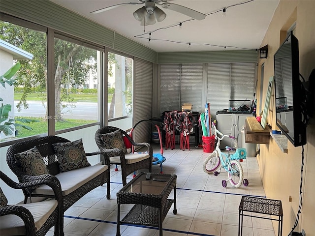 sunroom / solarium with ceiling fan