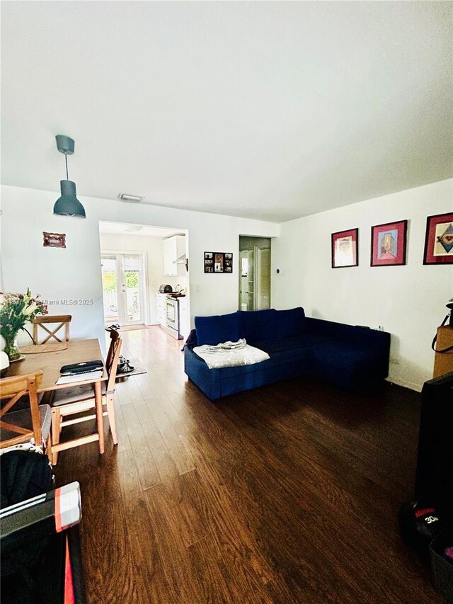 living room with hardwood / wood-style flooring