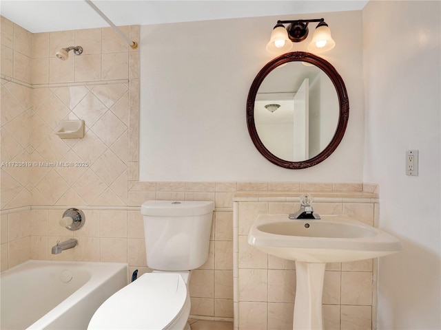 full bathroom featuring shower / tub combination, tile walls, and toilet