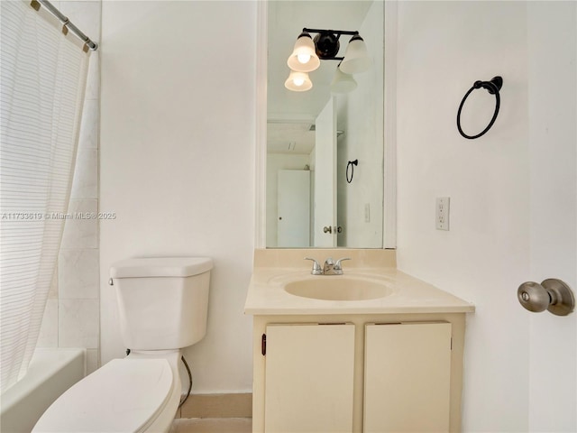 bathroom with toilet, shower / bathtub combination with curtain, and vanity