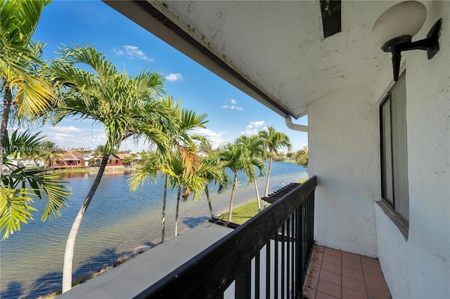 balcony featuring a water view