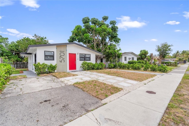 view of front of home with a front yard