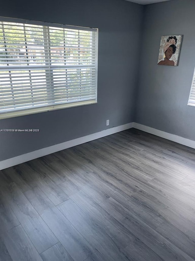 empty room featuring hardwood / wood-style floors