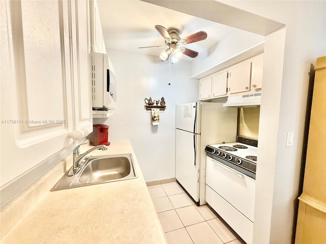 kitchen featuring white cabinetry, sink, light tile patterned floors, ceiling fan, and white appliances