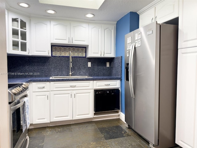 1450 Brickell Bay Dr Unit 306, Miami, FL 33131 - kitchen with appliances with stainless steel finishes, a sink, dark countertops, white cabinetry, and recessed lighting