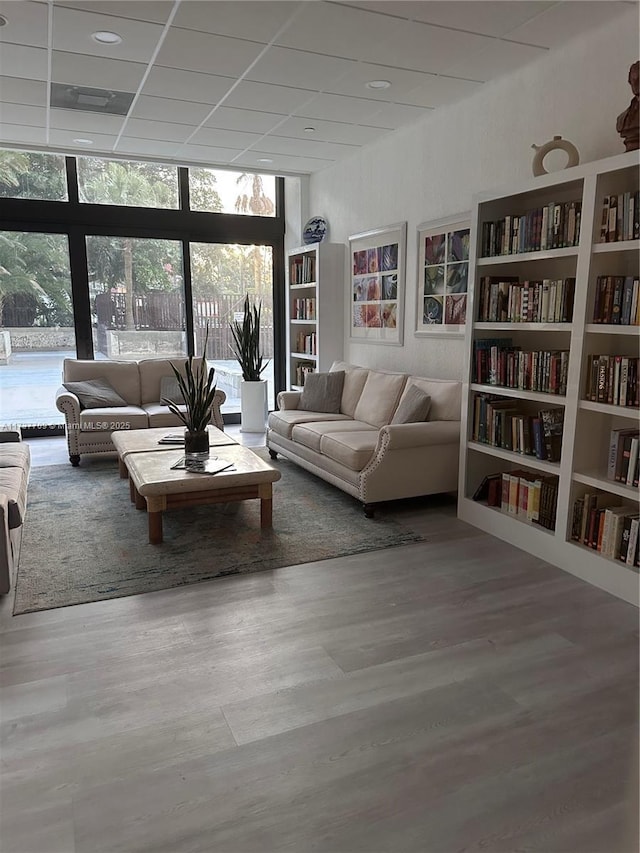 sunroom / solarium with a paneled ceiling