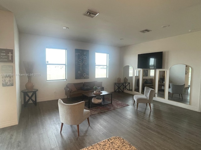 living room with dark hardwood / wood-style floors