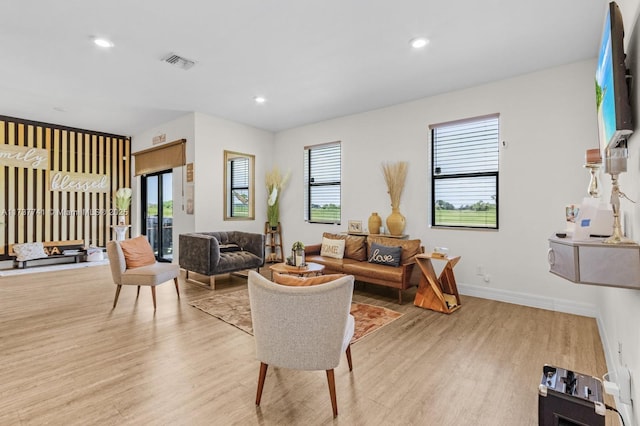 9049 Green Cir, La Belle, FL 33935 - living area featuring baseboards, visible vents, recessed lighting, and light wood-type flooring