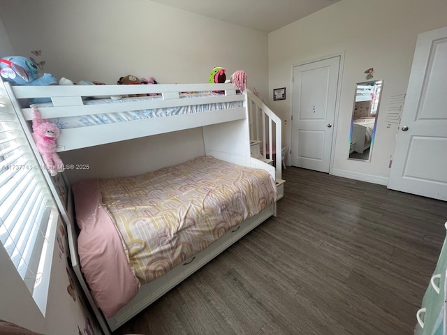 bedroom featuring dark hardwood / wood-style flooring