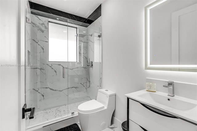 bathroom with vanity, an enclosed shower, and toilet