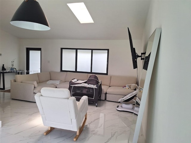 living room with a skylight