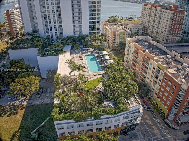 birds eye view of property featuring a water view