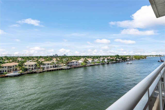 balcony featuring a water view