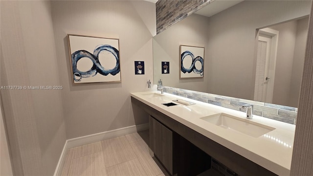 bathroom with vanity and backsplash