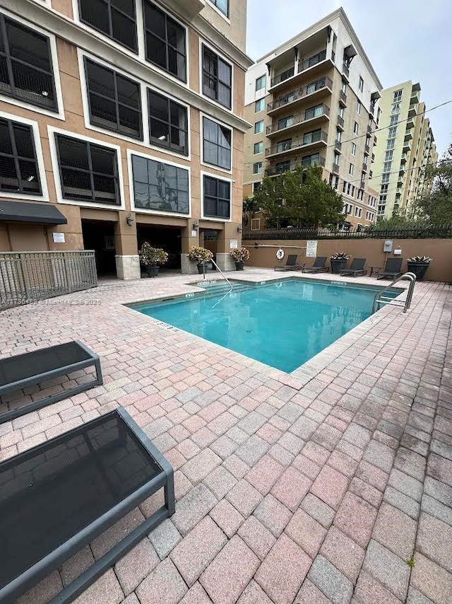 view of pool with a patio