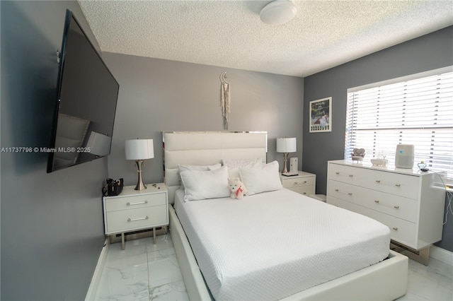 bedroom with a textured ceiling