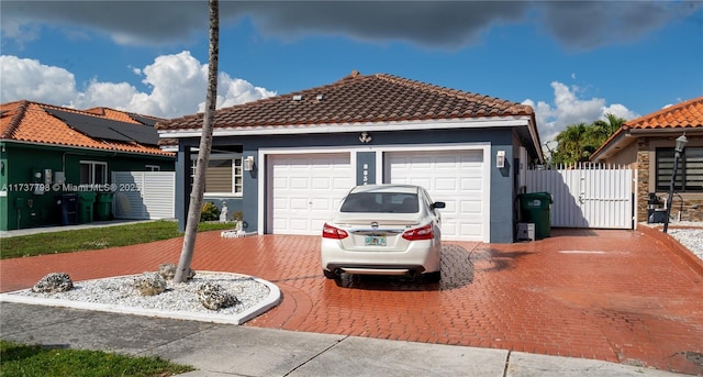 view of front of property featuring a garage